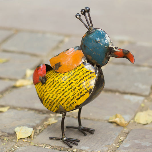Recycelte Vogelfigur mit Wappen